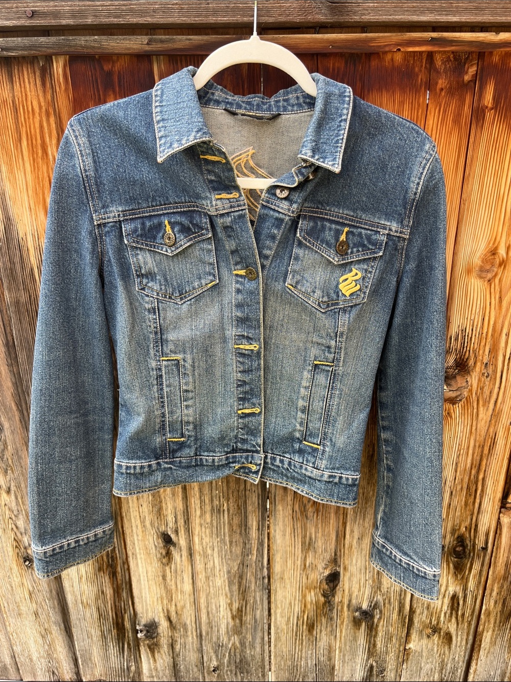 Rocawear Women's Blue Denim Jacket with Yellow Stitch Accents